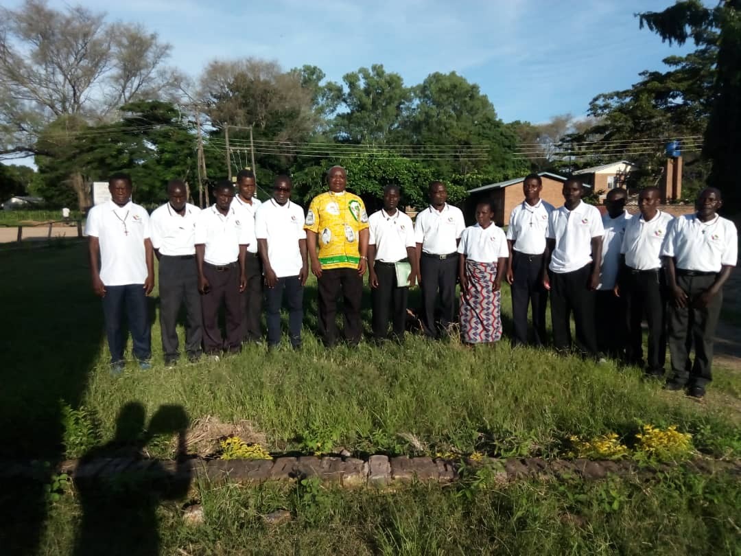 Bishop Martin Mtumbuka with the Local Missionaries.jpg